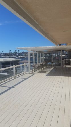 Winn Decking — Tan Gorilla Decking with Glass Rail